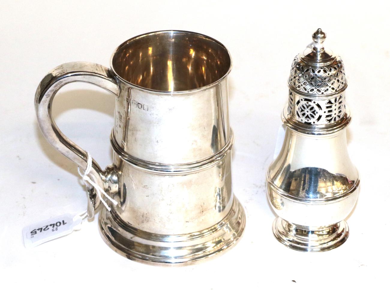 Lot 275 - An Edward VII silver mug and a George V silver caster, the mug by Thomas Bradbury and Sons, London