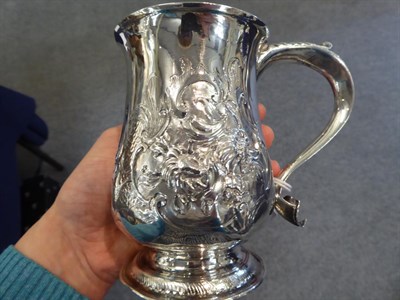 Lot 278 - A George III silver mug, unidentified makers mark J.S, London 1771, baluster and on spread...