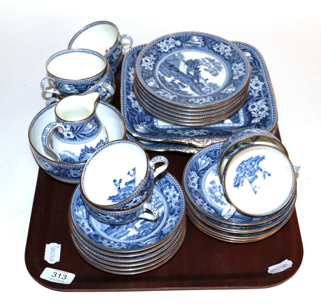 Lot 313 - A Wedgwood blue and white tea service including two cake plates