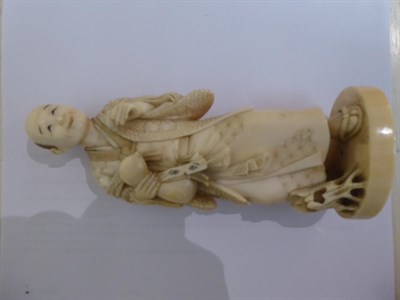 Lot 321 - A late 19th/early 20th century Japanese carved ivory figural Okimono, Meiji period, signed,...