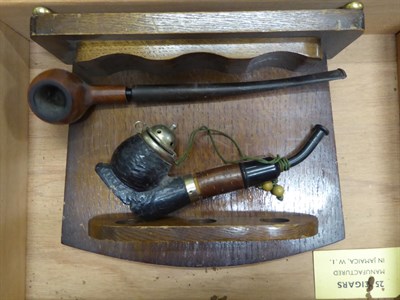 Lot 330 - A quantity of oak and mahogany smokers boxes, pipe racks, and a humidor; together with a...