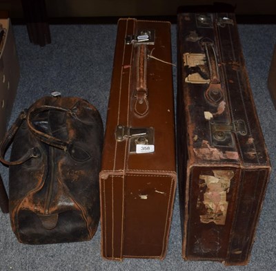 Lot 358 - Two leather suitcases and a Gladstone bag