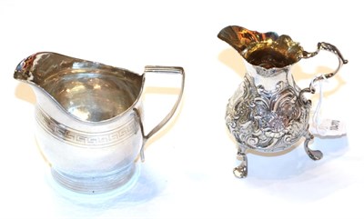 Lot 372 - A George II and a George III silver cream-jug, one London 1809, helmet-shaped and with...