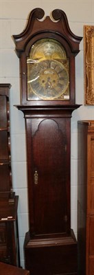 Lot 1210 - ~ An oak eight day longcase clock, 18th century, arch brass dial with applied plaque inscribed...