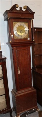 Lot 1212 - ~ An oak eight day longcase clock, square brass dial bearing a later inscription J.Ramsbottom,...