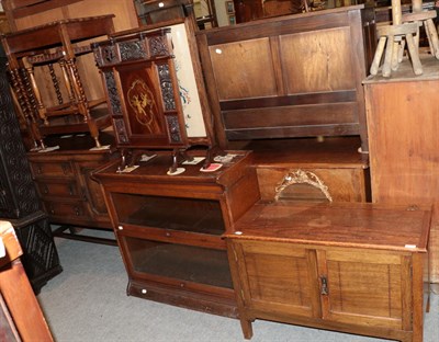 Lot 1218 - A quantity of furniture to include: two sectional bookcases; a small sideboard; two occasional...