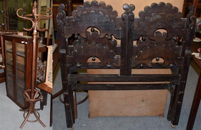 Lot 1224 - A quantity of furniture to include: Bentwood hat and coat stand; a glazed cabinet; a carved oak...