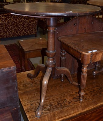 Lot 1230 - A George III mahogany circular flip top tripod table
