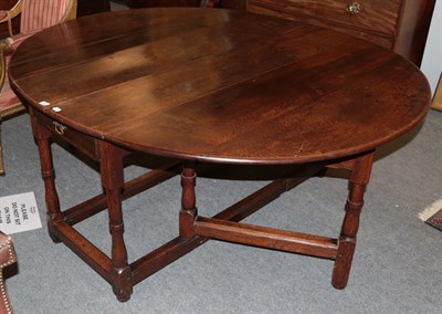 Lot 1243 - An early 18th century six/eight seater dining table, 167cm wide (extended)