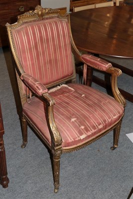 Lot 1244 - A Louis XIV style gilt wood fauteil with fluted legs and castors