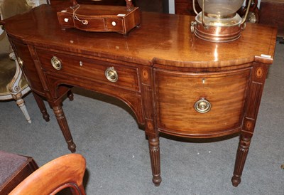 Lot 1245 - An early 19th century breakfront sideboard on turned and reeded legs, 167cm wide