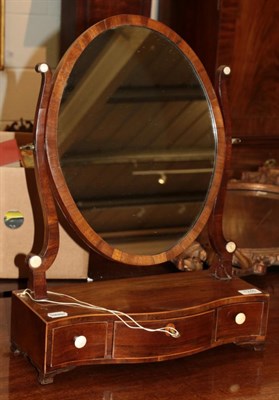 Lot 1246 - A George III serpentine shaped dressing table mirror