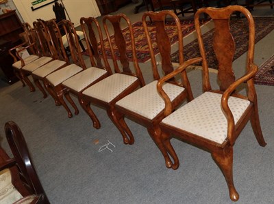 Lot 1264 - A set of eight walnut Queen Anne style dining chairs, including two carvers
