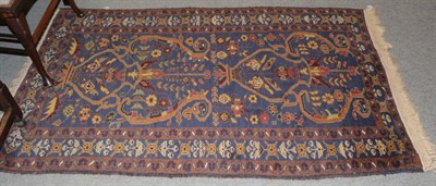 Lot 1266 - A good Turkish rug of star Kazak design, the straw field with two stellar medallions surrounded...