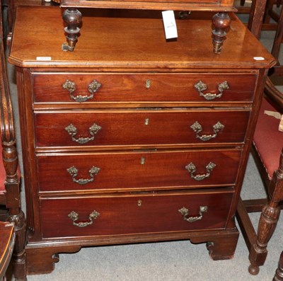 Lot 1279 - A George III mahogany four graduated drawer chest with fluted stiles and bracket supports, 77cm...