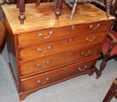 Lot 1282 - A Georgian mahogany chest of drawers