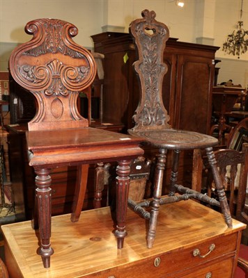 Lot 1283 - A Victorian carved mahogany hall chair and a carved oak spinning chair (2)