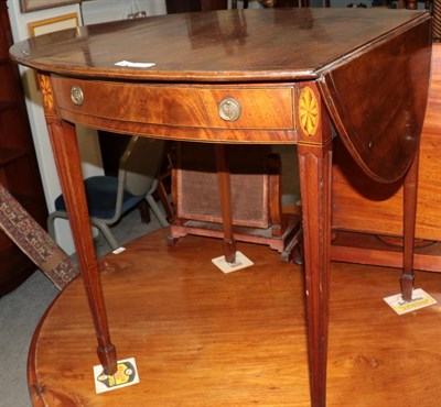 Lot 1284 - A George III mahogany Pembroke table, oval top, single drawer, on fluted legs to castors