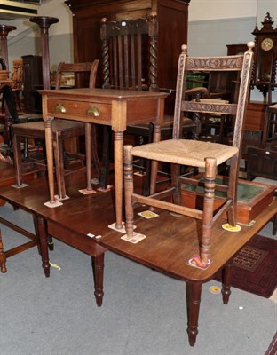 Lot 1289 - A George III mahogany drop leaf dining table; an oak side table fitted one drawer; a George III...