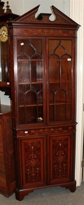 Lot 1308 - An Edwardian Sheraton revival mahogany and marquetry inlaid freestanding corner cabinet,...