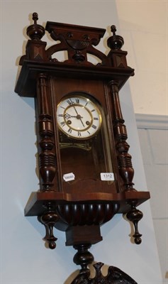 Lot 1312 - A small mahogany Vienna type striking wall clock