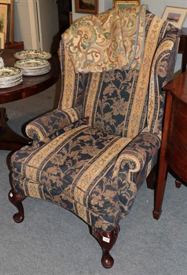 Lot 1326 - A Bridgecraft wing back chair in the Georgian style, 80cm wide