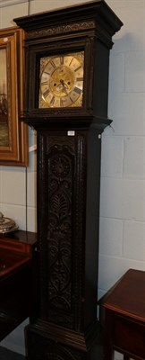 Lot 1330 - A carved oak eight day longcase clock, square dial with chapter ring bearing a later...