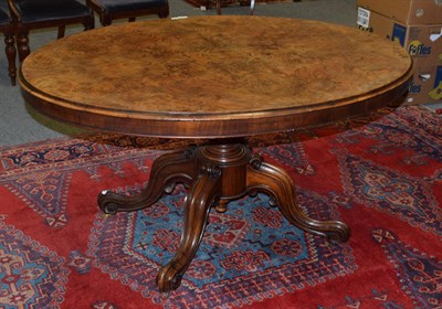 Lot 1340 - A Victorian burr walnut and quarter veneered breakfast table with moulded top, 143cm wide