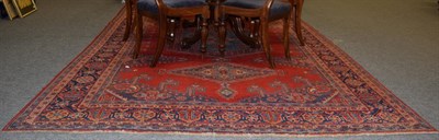 Lot 1342 - A Viss carpet, the blood red field with central medallion framed by spandrels and stylised...