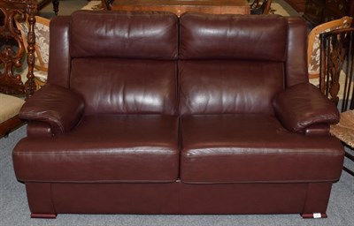 Lot 1351 - A Barker and Stonehouse two seater brown leather settee