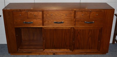 Lot 1352 - A modern Starbay Indian rosewood sideboard, fitted with a bank of eight drawers and two...