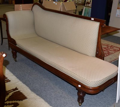 Lot 1365 - An early Victorian mahogany framed chaise longue, later recovered with a padded back support, arms