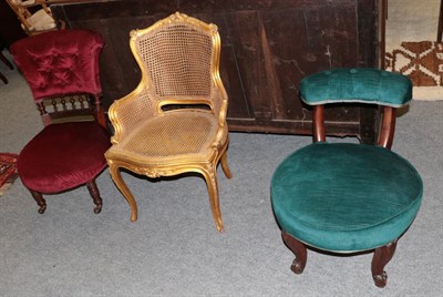 Lot 1372 - A Victorian nursing chair upholstered in red velvet; a Victorian chair upholstered in green velvet