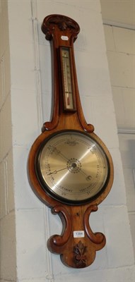 Lot 1384 - A Victorian carved mahogany wheel barometer; a Victorian mahogany dressing mirror (a.f.); and...