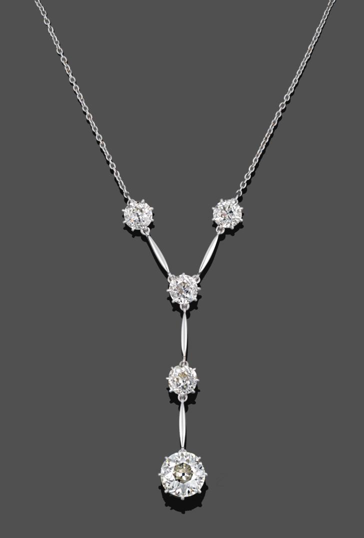 Lot 1006 - An Early 20th Century Diamond Necklace, comprised of five old cut diamonds forming a Y-shaped drop