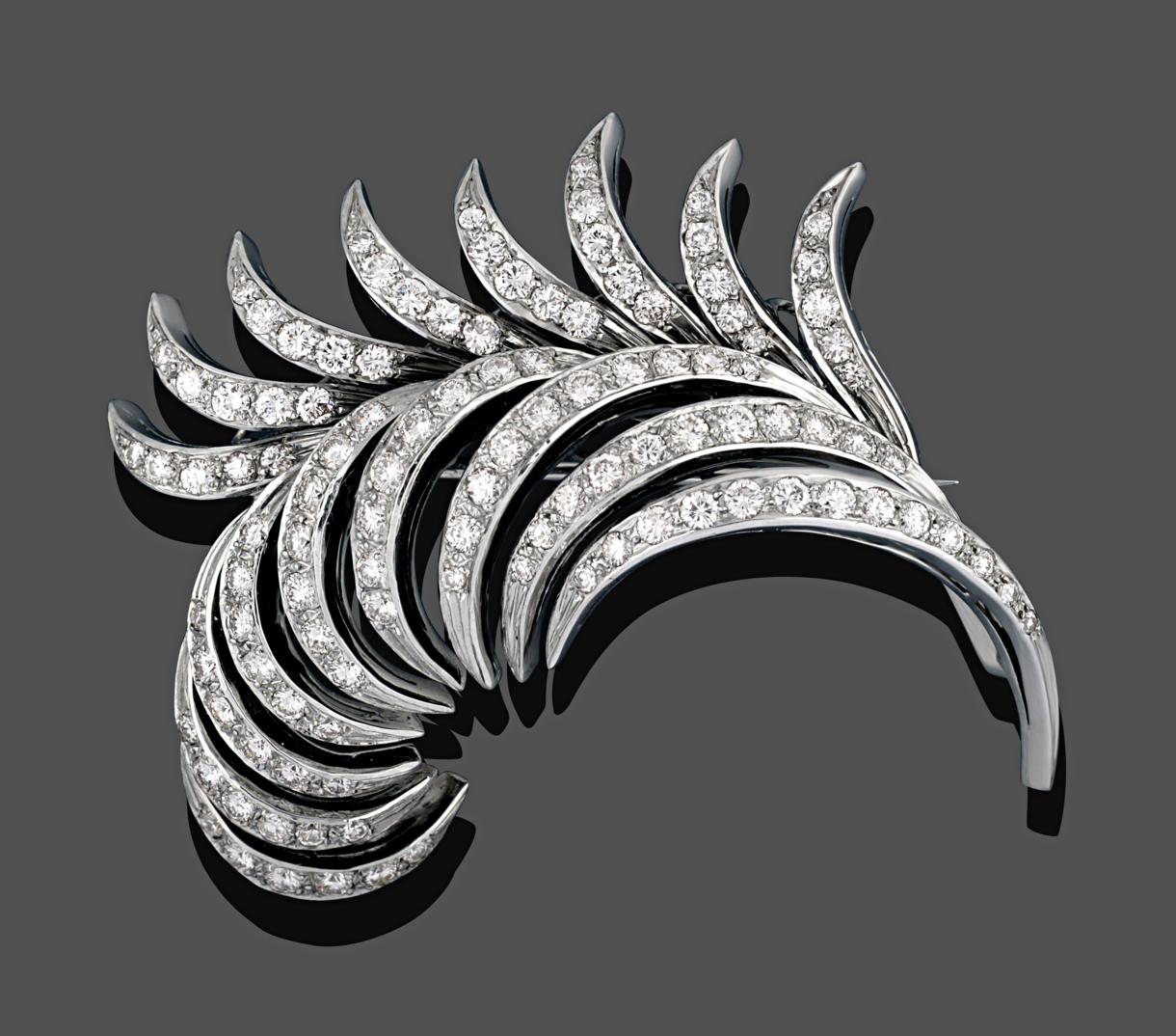 Lot 1007 - An 18 Carat White Gold Diamond Brooch, the frond motif set throughout with round brilliant cut...