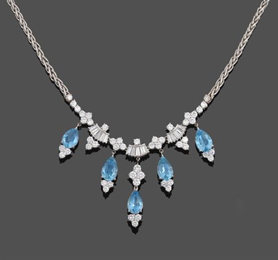 Lot 1011 - An Aquamarine and Diamond Necklace, four clusters of four round brilliant cut diamonds...