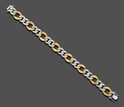 Lot 1031 - An 18 Carat Two-Colour Gold Diamond Set Flat Curb Link Bracelet, pairs of white links inset...