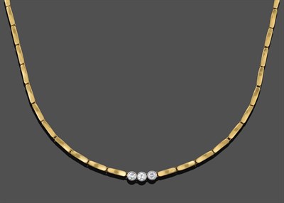 Lot 1034 - A Diamond Three Stone Necklace, three round brilliant cut diamonds in white rubbed over settings to