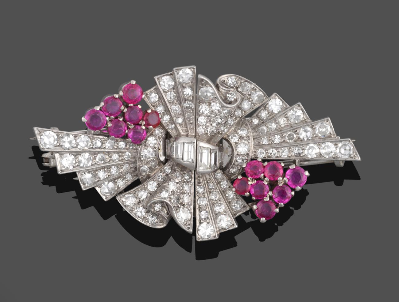 Lot 1046 - A Ruby and Diamond Double Clip Brooch, circa 1940's, formed of a bow motif centrally with spray...