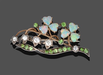 Lot 1090 - An Opal, Diamond and Demantoid Garnet Brooch, in the form of lily of the valley, with two...