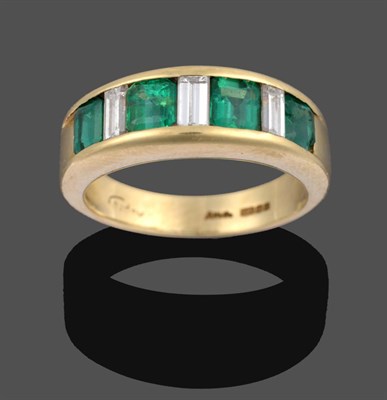 Lot 1095 - An 18 Carat Gold Emerald and Diamond Half Hoop Ring, by Asprey, four emerald-cut emeralds alternate