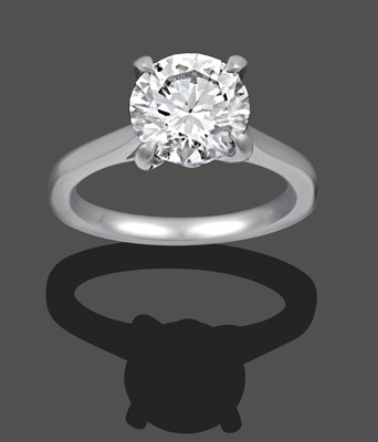 Lot 1123 - A Platinum Diamond Solitaire Ring, the round brilliant cut diamond in a white four claw setting, on