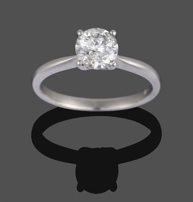 Lot 1147 - A Platinum Diamond Solitaire Ring, the round brilliant cut diamond in a four-claw setting, to a...