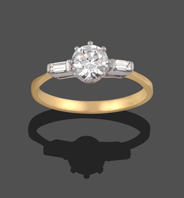 Lot 1151 - An 18 Carat Gold Diamond Solitaire Ring, the round brilliant cut diamond to shoulders set with...