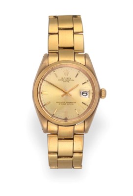 Lot 1163 - A 9 Carat Gold Automatic Calendar Centre Seconds Wristwatch, signed Rolex, Oyster Perpetual,...