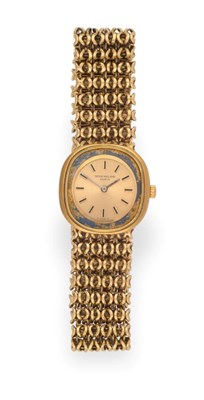 Lot 1166 - A Lady's 18ct Gold Wristwatch, signed Patek Philippe, model:  Golden Ellipse, ref: 4172, circa...