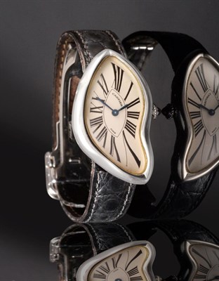 Lot 1184 - A Fine and Rare Lady's Platinum Asymmetric Wristwatch, signed Cartier, Paris, model: Crash,...