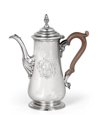 Lot 1203 - A George II Silver Coffee-Pot, by Francis Crump, London, 1743, pear-shaped and on spreading...