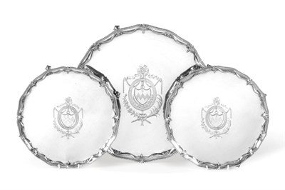 Lot 1210 - A Set of Three George III Silver Salvers, by Richard Rugg, London, 1776, each shaped circular...